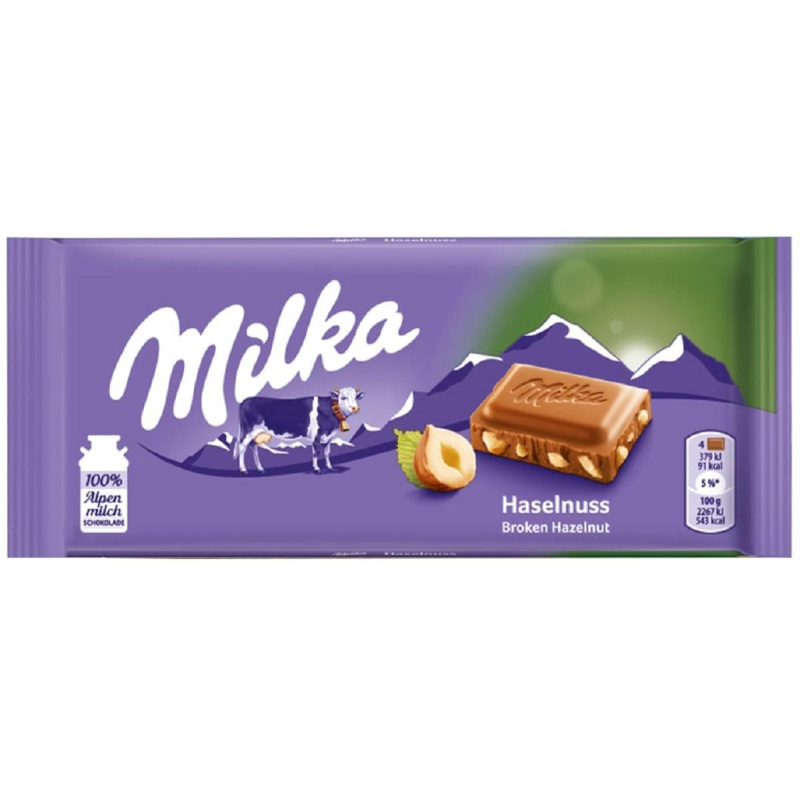 Шоколад Milka молочный с кусочками лесного ореха 100 г